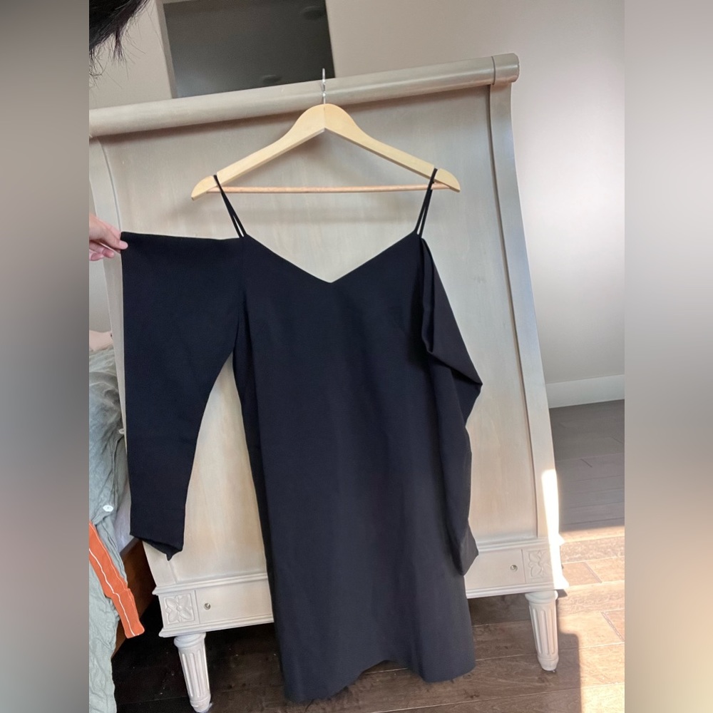 Small black mini dress with long sleeves